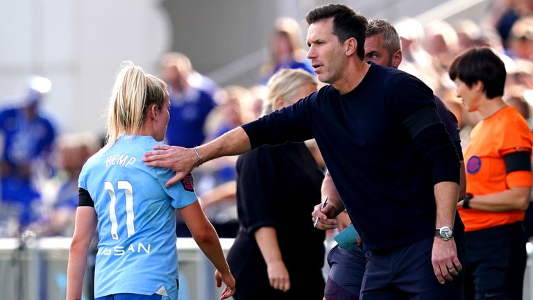 Manchester City manager Gareth Taylor pats Lauren Hemp on the shoulder as she leaves the pitch after receiving a red card