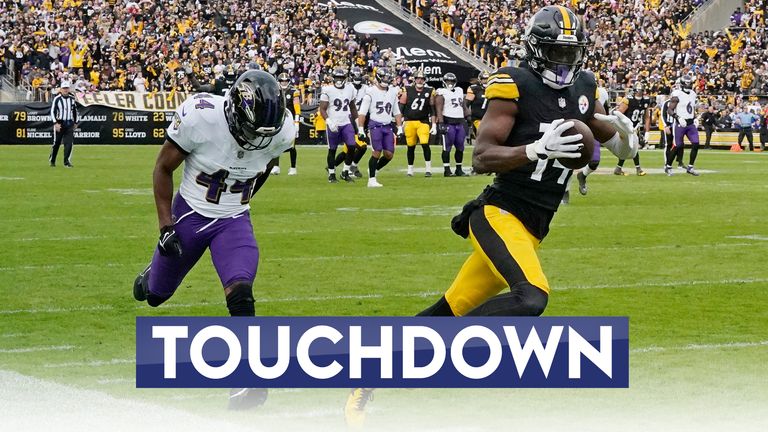 Pittsburgh Steelers wide receiver George Pickens (14) catches a pass in front of Baltimore Ravens cornerback Marlon Humphrey, left, and carries it into the endzne for a touchdown in the second half of an NFL football game in Pittsburgh, Sunday, Oct. 8, 2023. (AP Photo/Gene J. Puskar)


