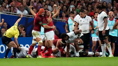 Portugal's players celebrate a try in their stunning win against Fiji